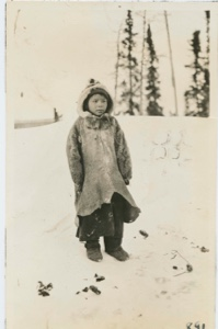 Image: Nascopie Indian [Innu] girl-no mittens-sleeves of coat tied up